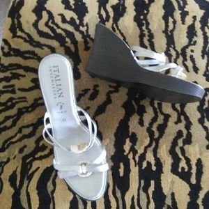 Silver wedge sandals fits like 10